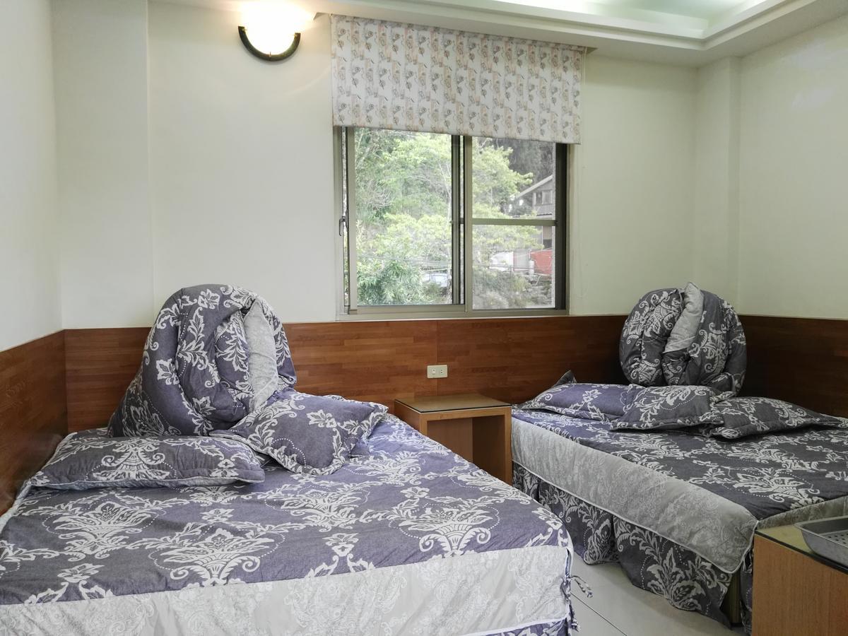 Qun Feng Hotel Fenchihu Extérieur photo